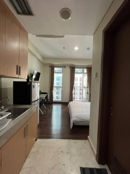 West Gem Modern At Puri Orchard Apartemen