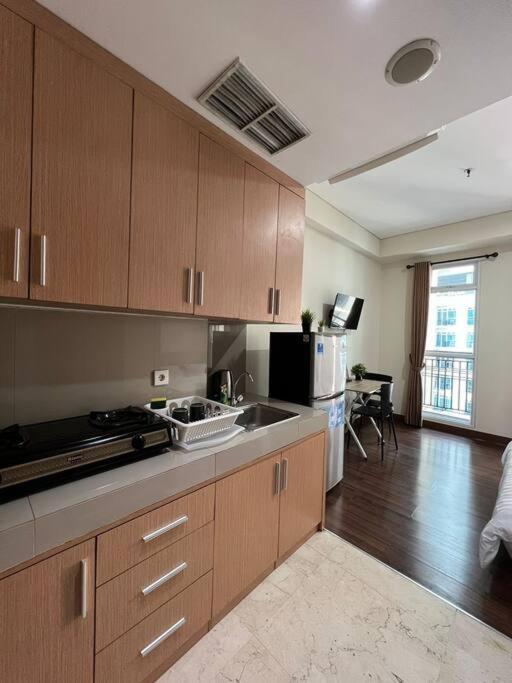 Apartemen West Gem Modern At Puri Orchard *